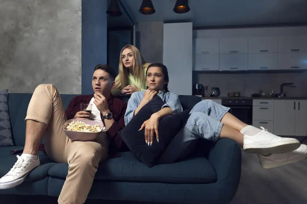 team family watching smart tv home